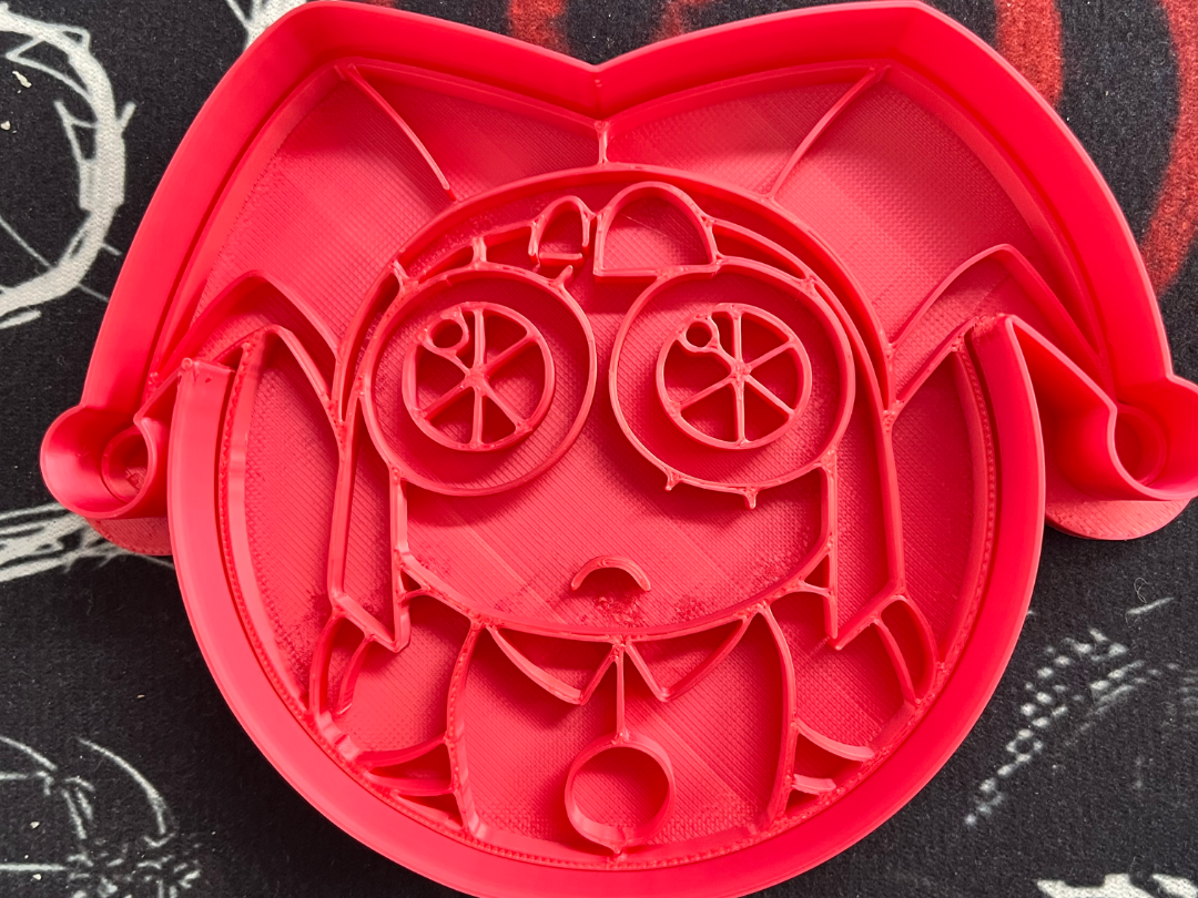 Pomni cutter and stamp