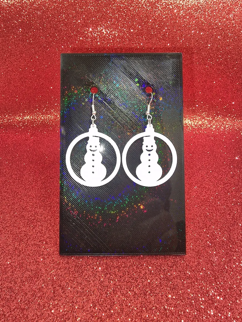 Snowman in a ball earrings view 2