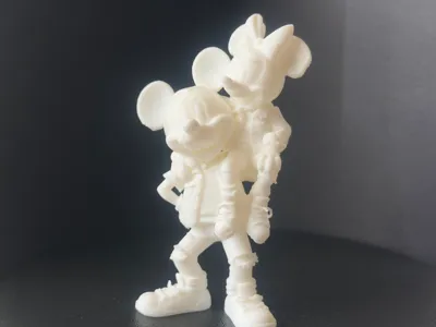 Mickey has Minnie on his shoulder