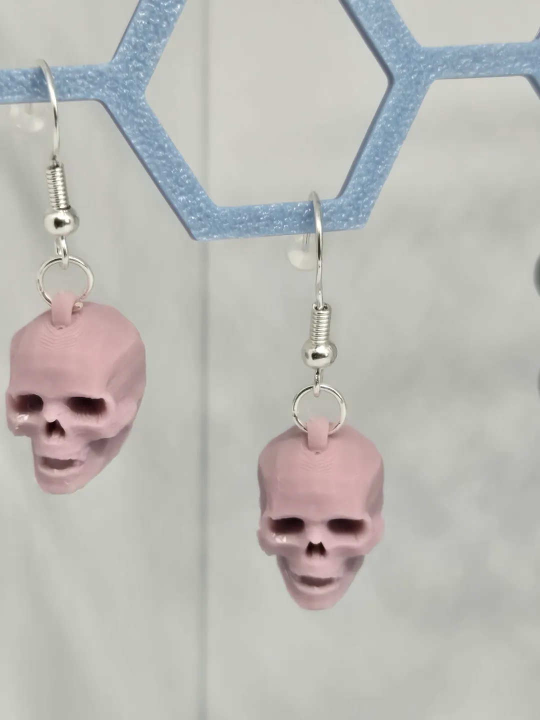 Skull earrings view 2