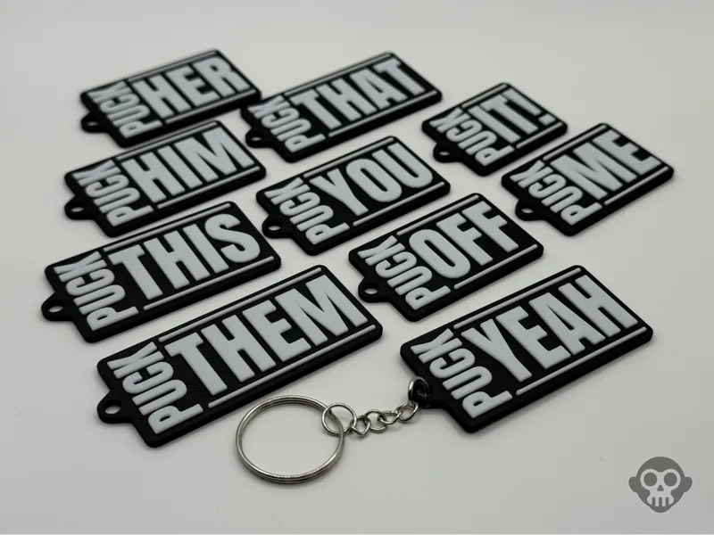 Cheeky Puck'in Keychains (10 Variations)
