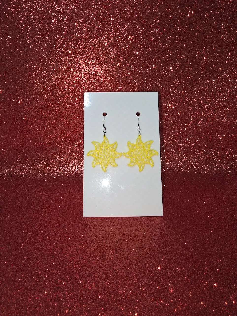 Tribal sun earrings view 2