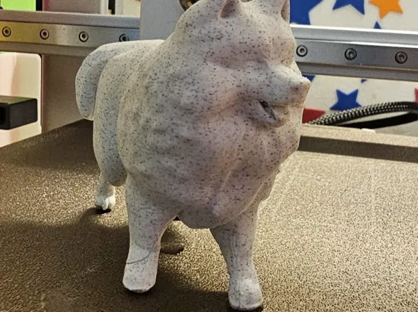 Figurine réaliste de chien Samoyède