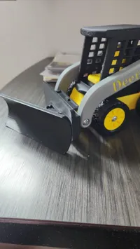 Chasse-neige jouet pour mini-chargeuse Deere — photo 1