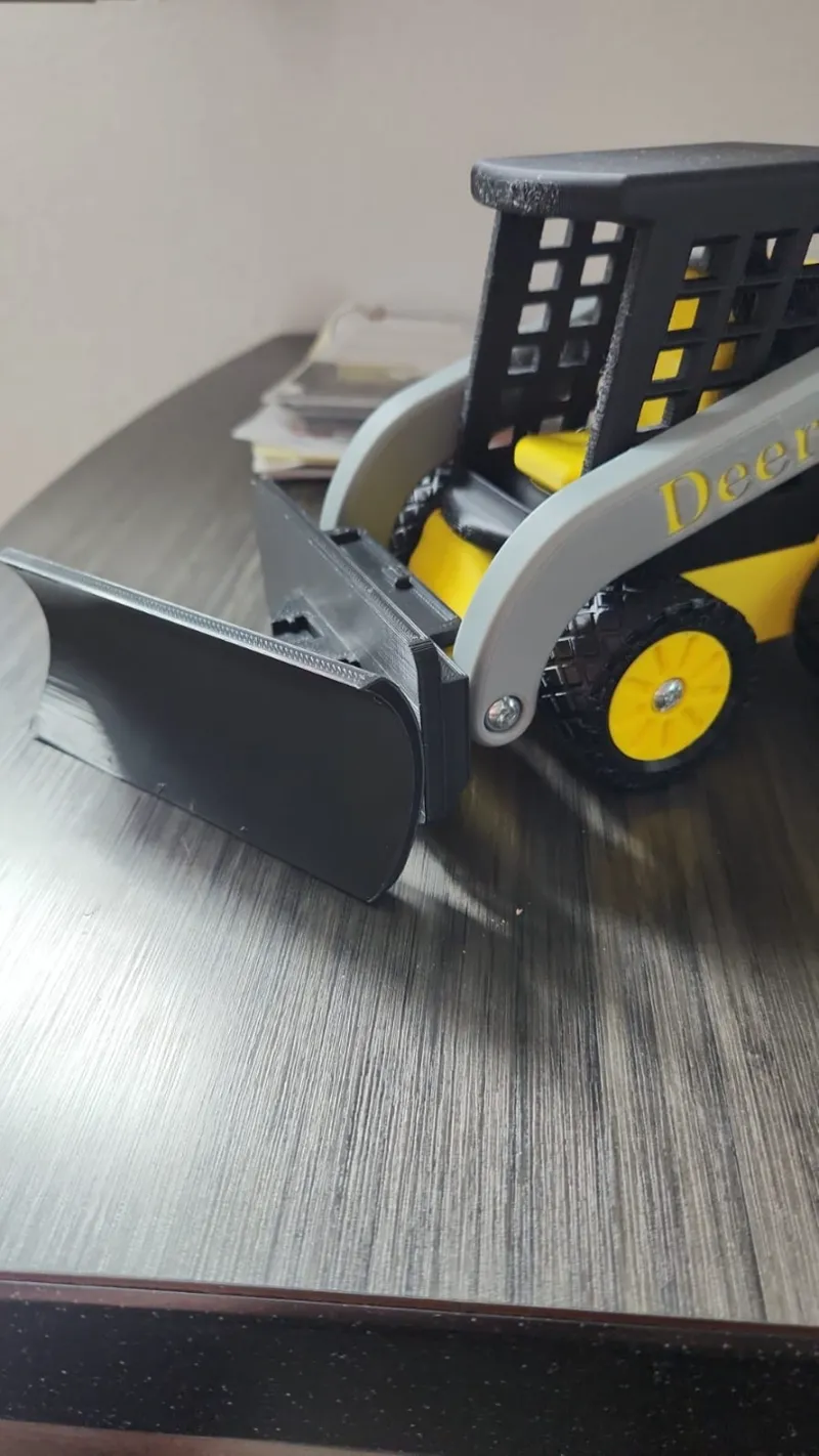 Deere Skid steer snowplow