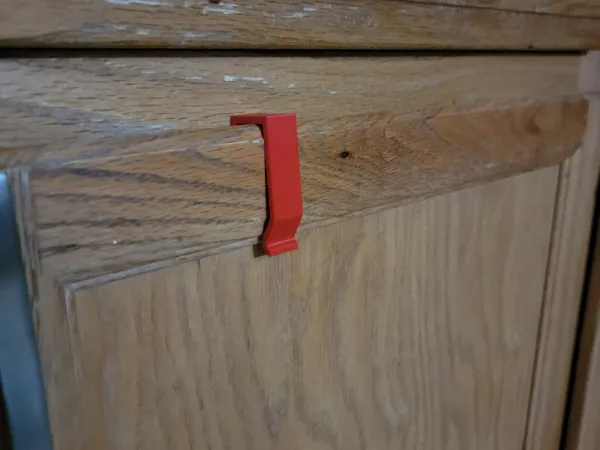 Loquet de sécurité sans vis pour placard