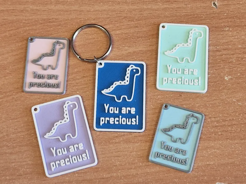 Cute motivational dino keychain