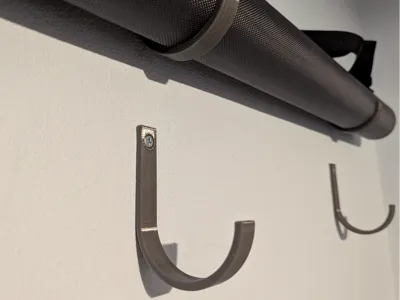 Fly fishing rod tube wall hooks
