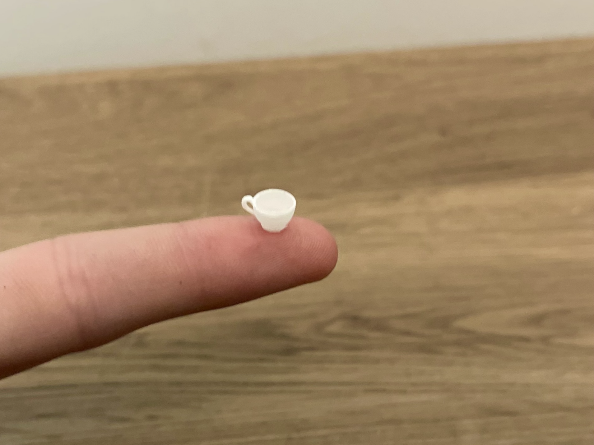 Worlds Smallest Tea Cup (only .09 grams)