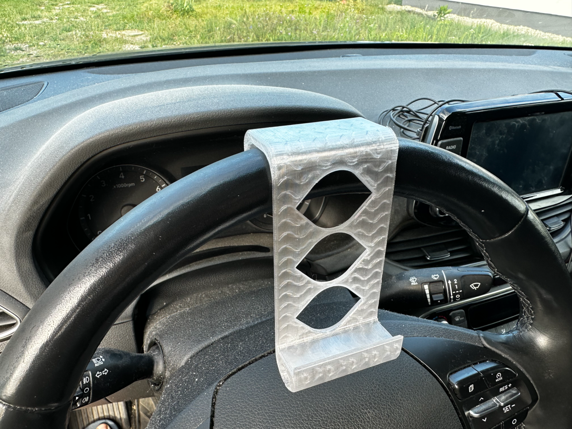 Customizable Car Wheel Tablet Hook Stand Generator