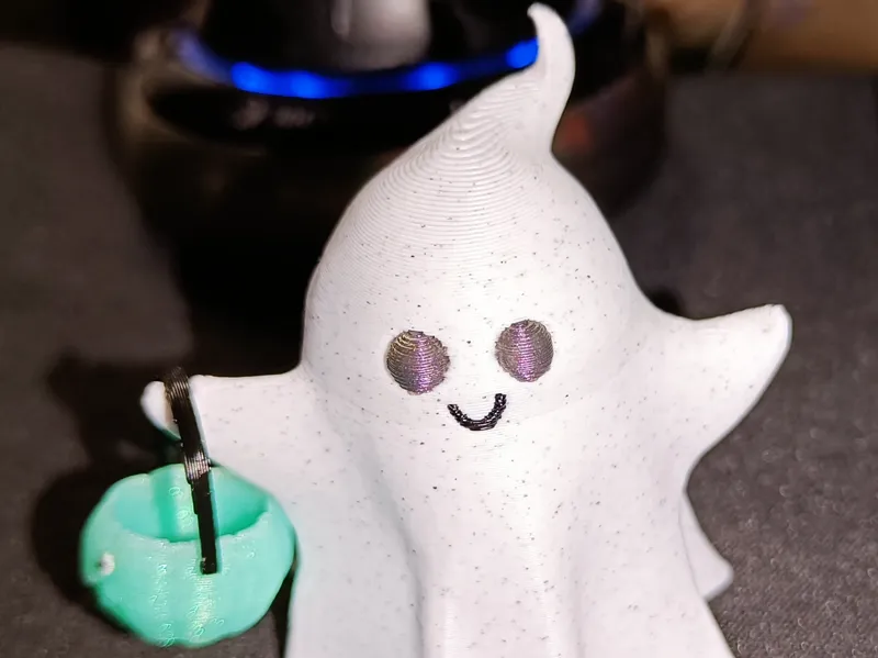 Halloween Ghost holding a Pumpkin Basket