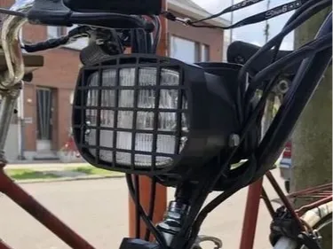 Front light guard for Piaggio Ciao P, PV, PX, and PXV