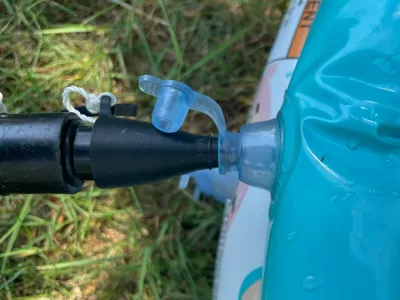 Double-action pump adapter for paddling pool