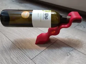 Balancing wine bottle holder with 67