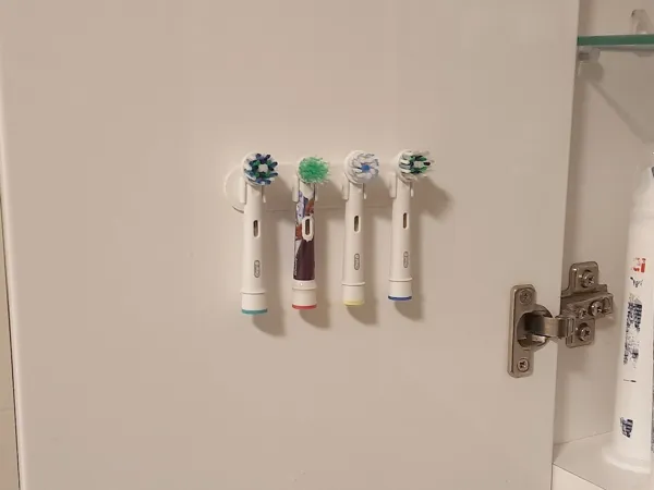 Support mural pour têtes de brosse à dents Oral-B