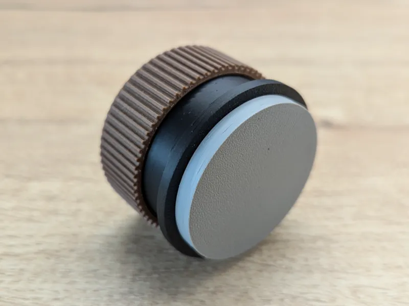 Spring-loaded Tamper