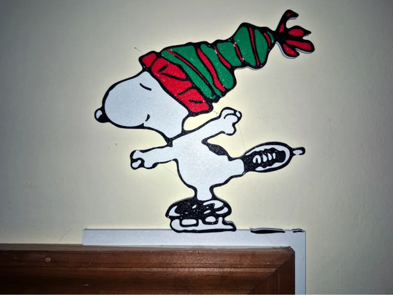 Snoopy Skating by Charles Shulz door topper
