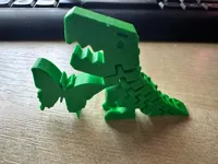 Flexi Rex avec papillon — figurine articulée — photo 2