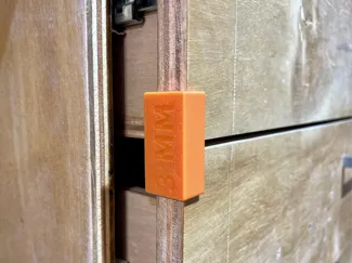 Drawer face spacer shims
