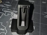Changed size to fit Marlin 22lr mag, Added finger support