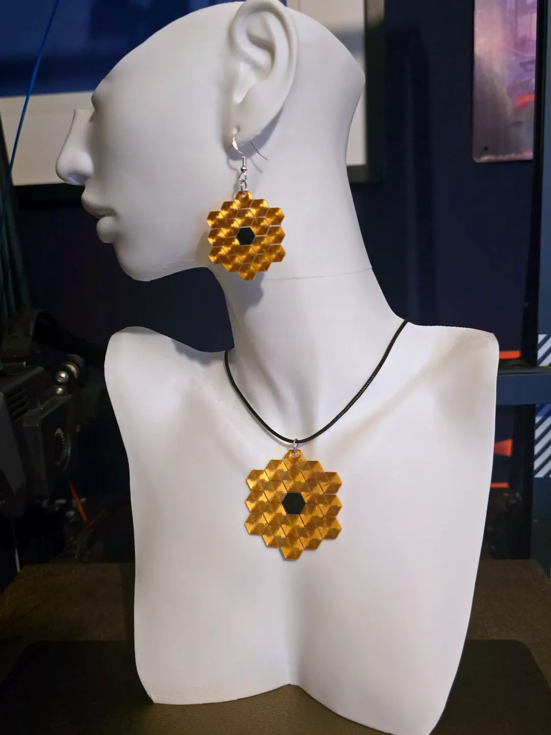 JWST Earrings and Pendant on fabric. view 2