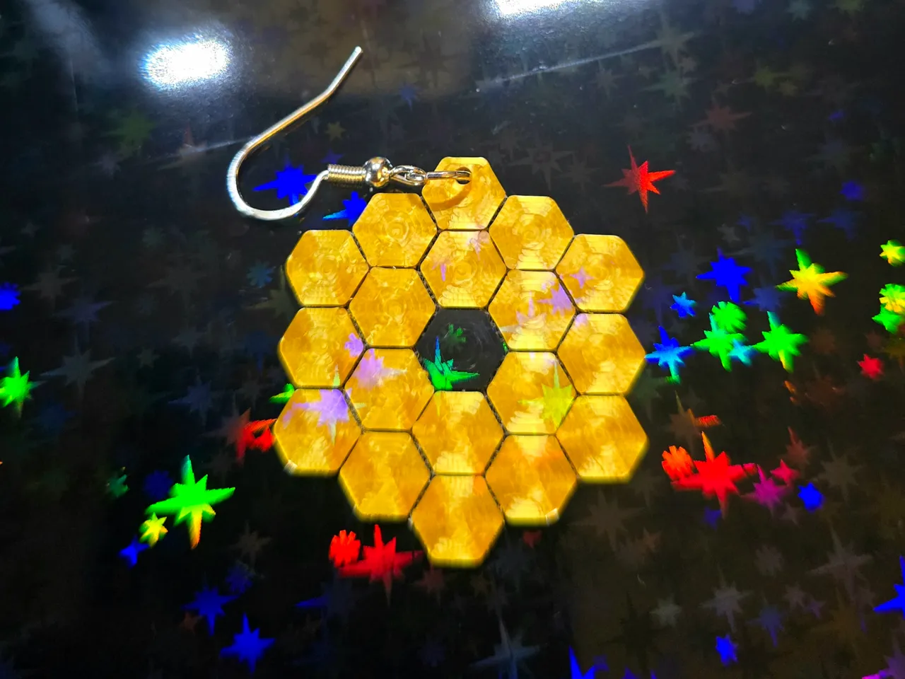 JWST Earrings and Pendant on fabric. view 4