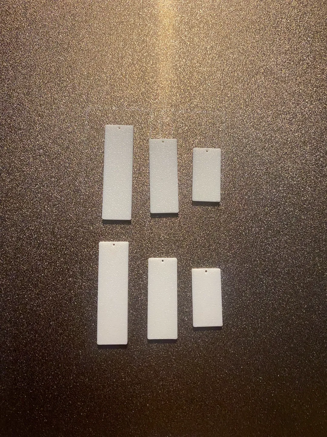 3x different size earrings view 2