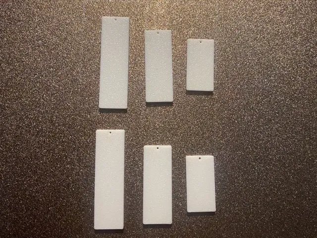 3x different size earrings