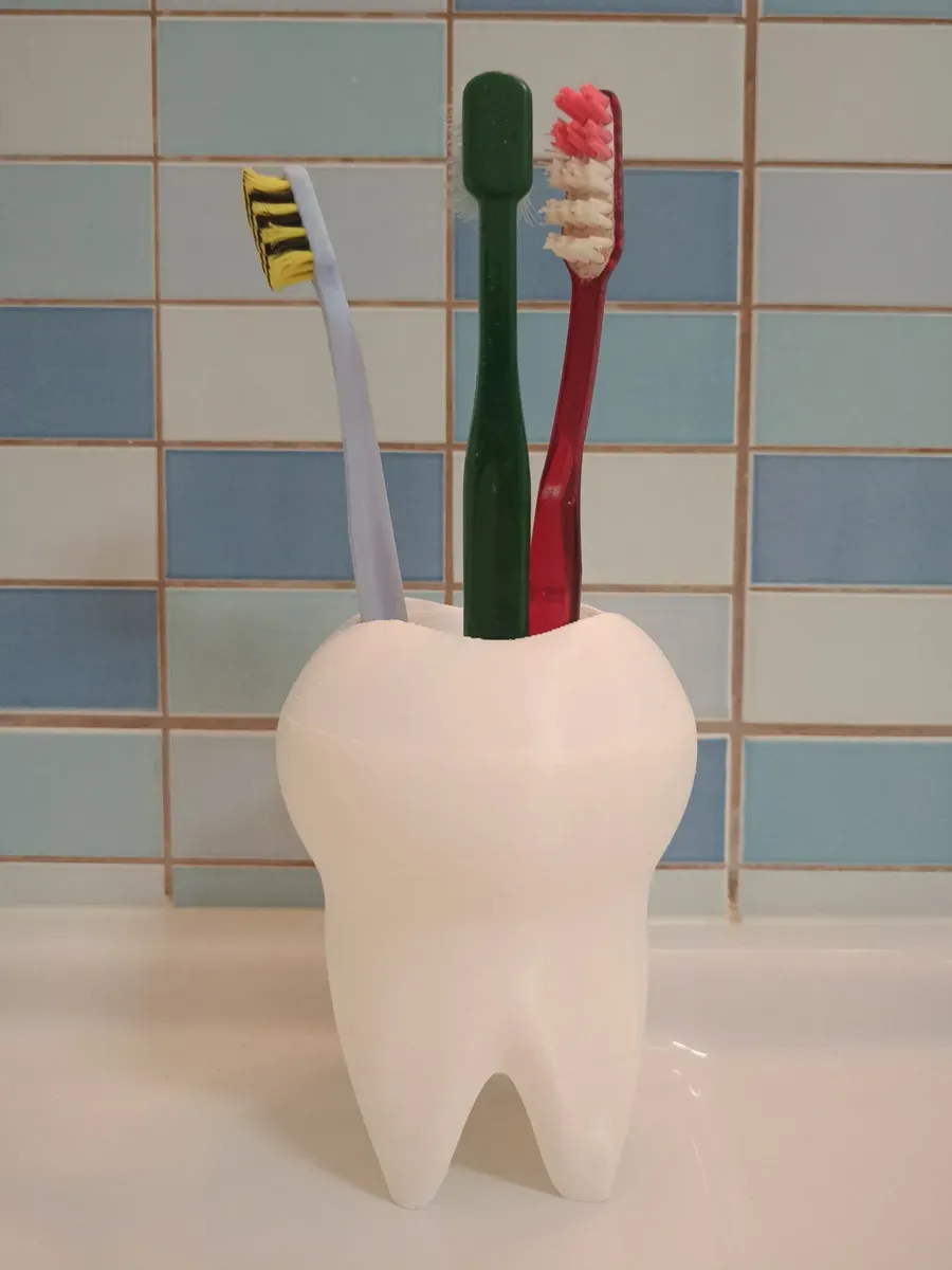 Porte-brosses à dents en forme de dent
