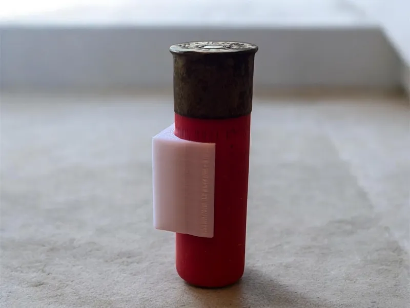 shotgun shell holder + Can attach to a shotgun