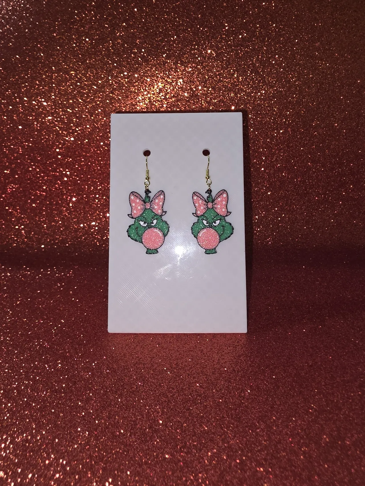 Lady Grinch earrings view 2