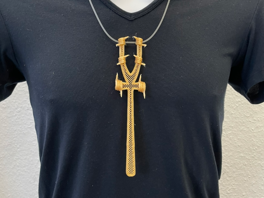Pendant with barbed wire in ancient egypt style