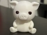 Petit cochon assis — figurine — photo 1