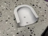 Wall-mounted remote cradle