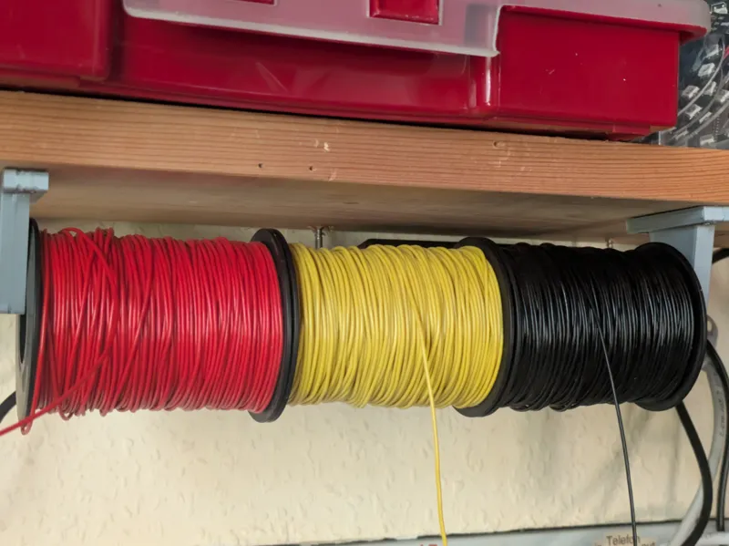 Cable Roll Hanger for Under-Shelf Mounting