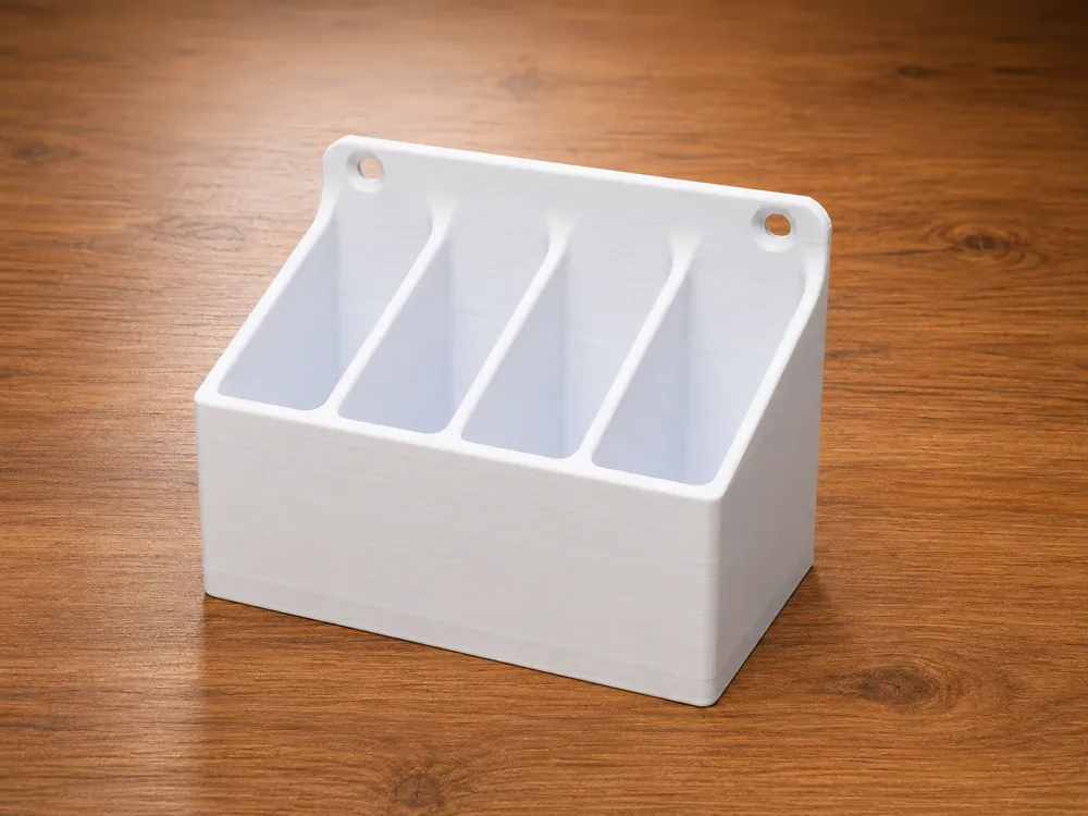 Soporte: Universal Wall-Mounted 4-Slot Holder. Referencia del modelo original.
