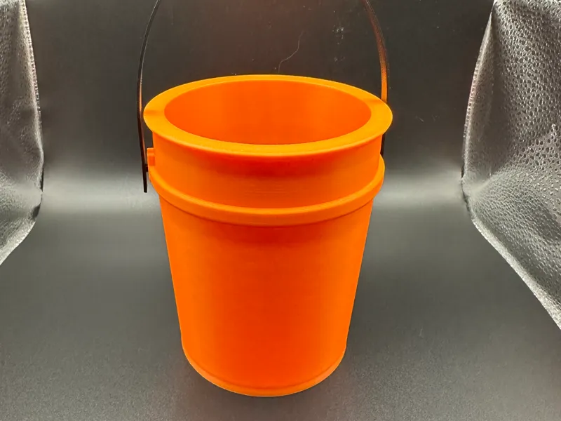 Mini 5 gallon Bucket 4.5 inches tall by 3.75 wide.