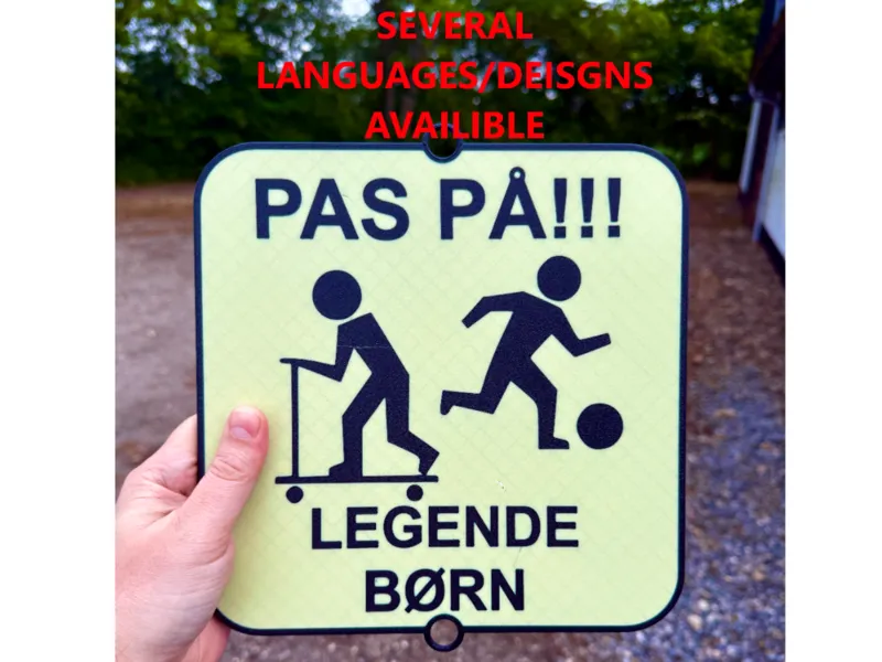 Playing kids warning sign for road