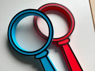 Vergrootglas met zoekprenten