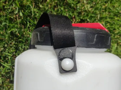 Sprayer strap holder
