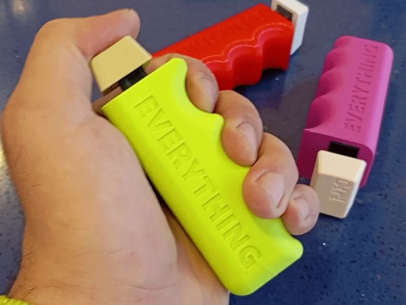 Control and escape keycap handheld clicker
