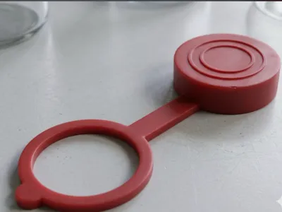 Flexible cap - tethered cap