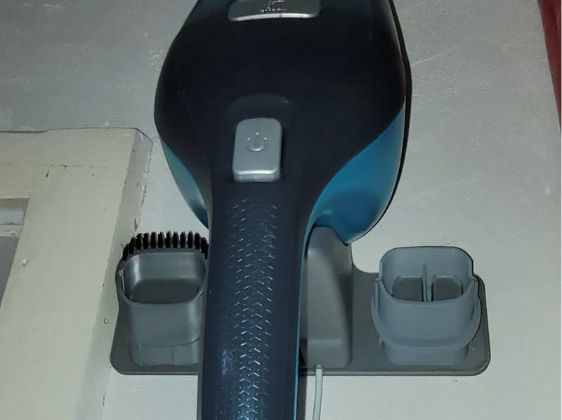 holder for vacuum cleaner nozzles