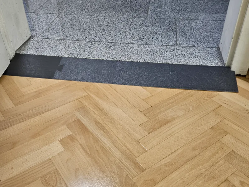 Rampe pour pas de porte pour robot aspirateur