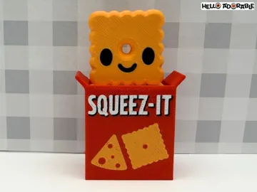 Objeto manipulable: Squeez-It Fidget Clicker Toy — vista de referencia 4