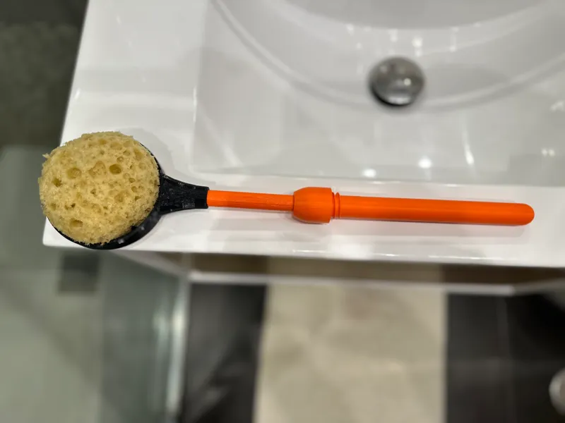 Palo de ducha adaptable y ergonómico para esponja 