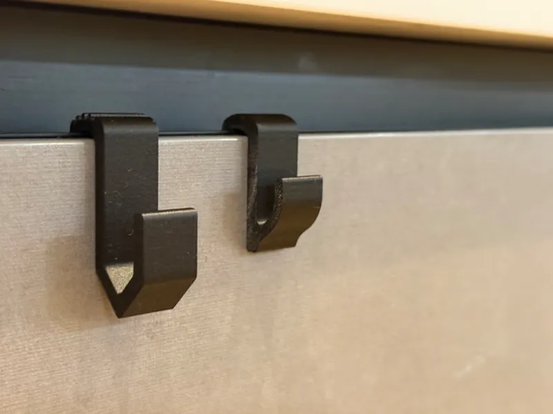 Towel hook for slim profile panels