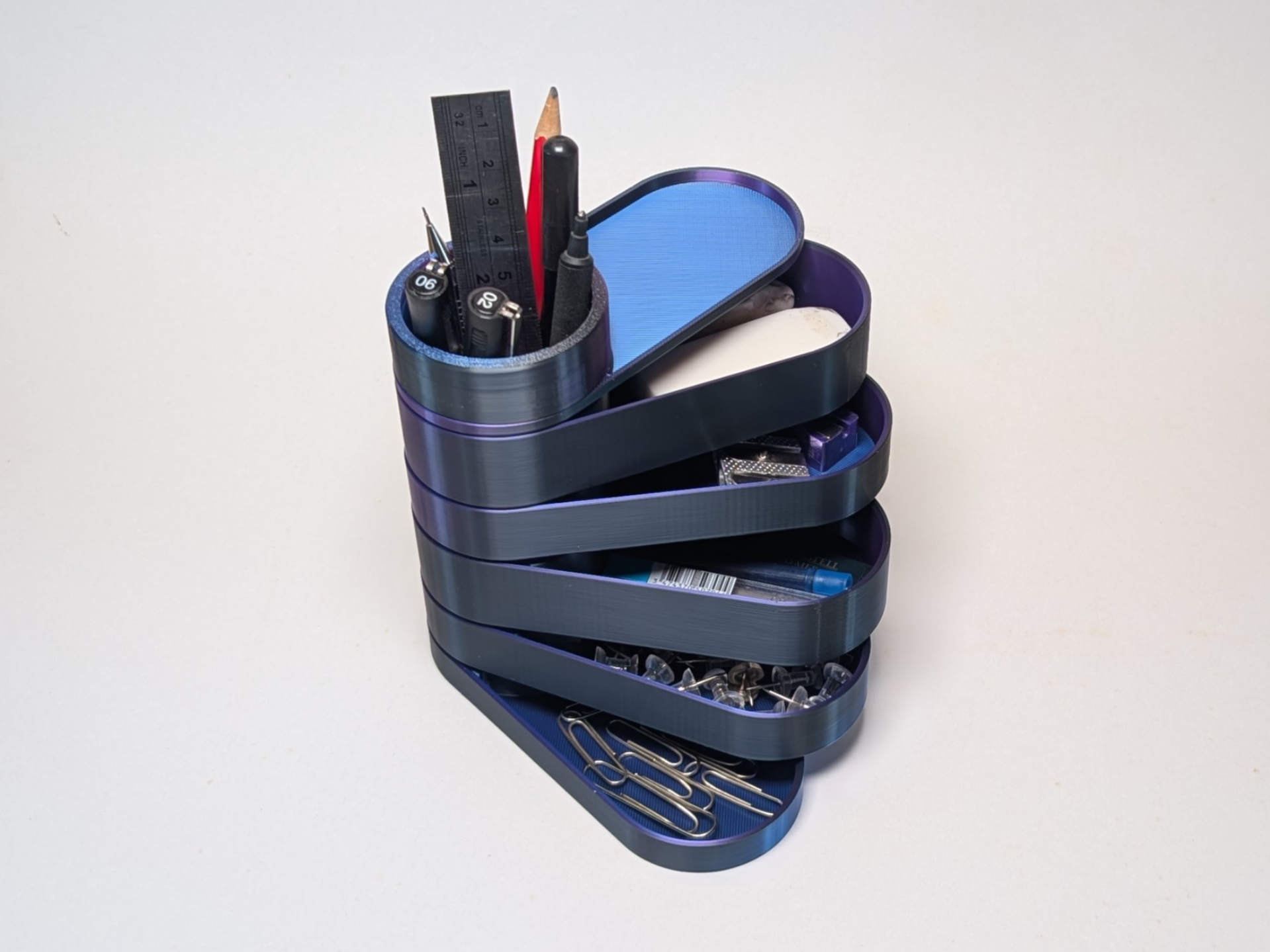Pencil organizer with rotating desk storage