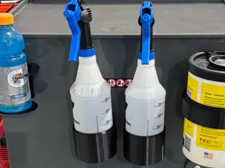 Magnetic spray bottle holder 