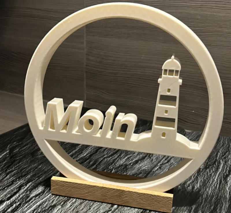 Aufsteller mit Leuchtturm und "Moin" Schriftzug